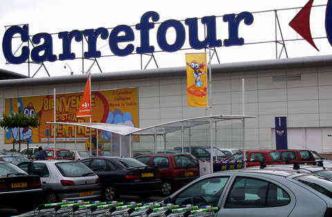 Analiză: Cine este interesat de achiziţia Carrefour România