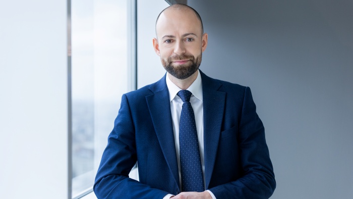 Sebastian Popescu, Partener EY: Lider-punte între maluri și mize